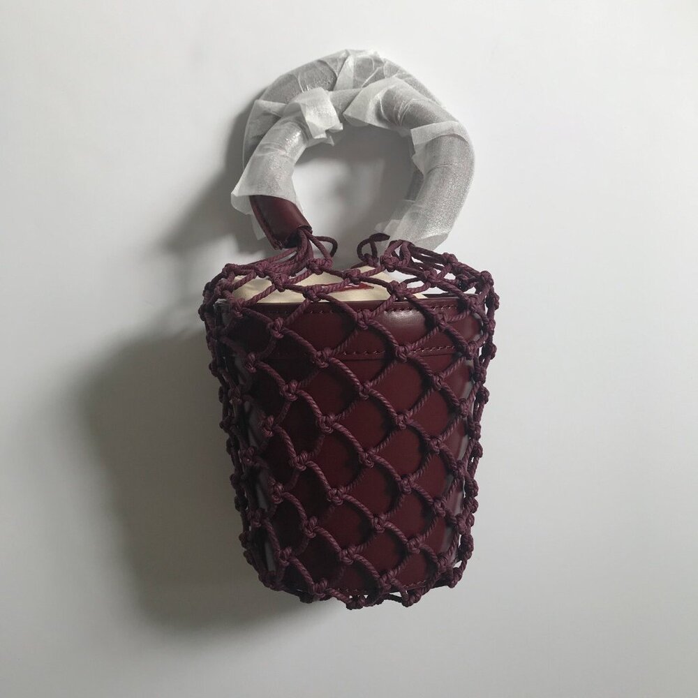 STAUD Mini Moreau Leather and Macramé Bucket Bag in Bordeaux - Picture 1 of 4